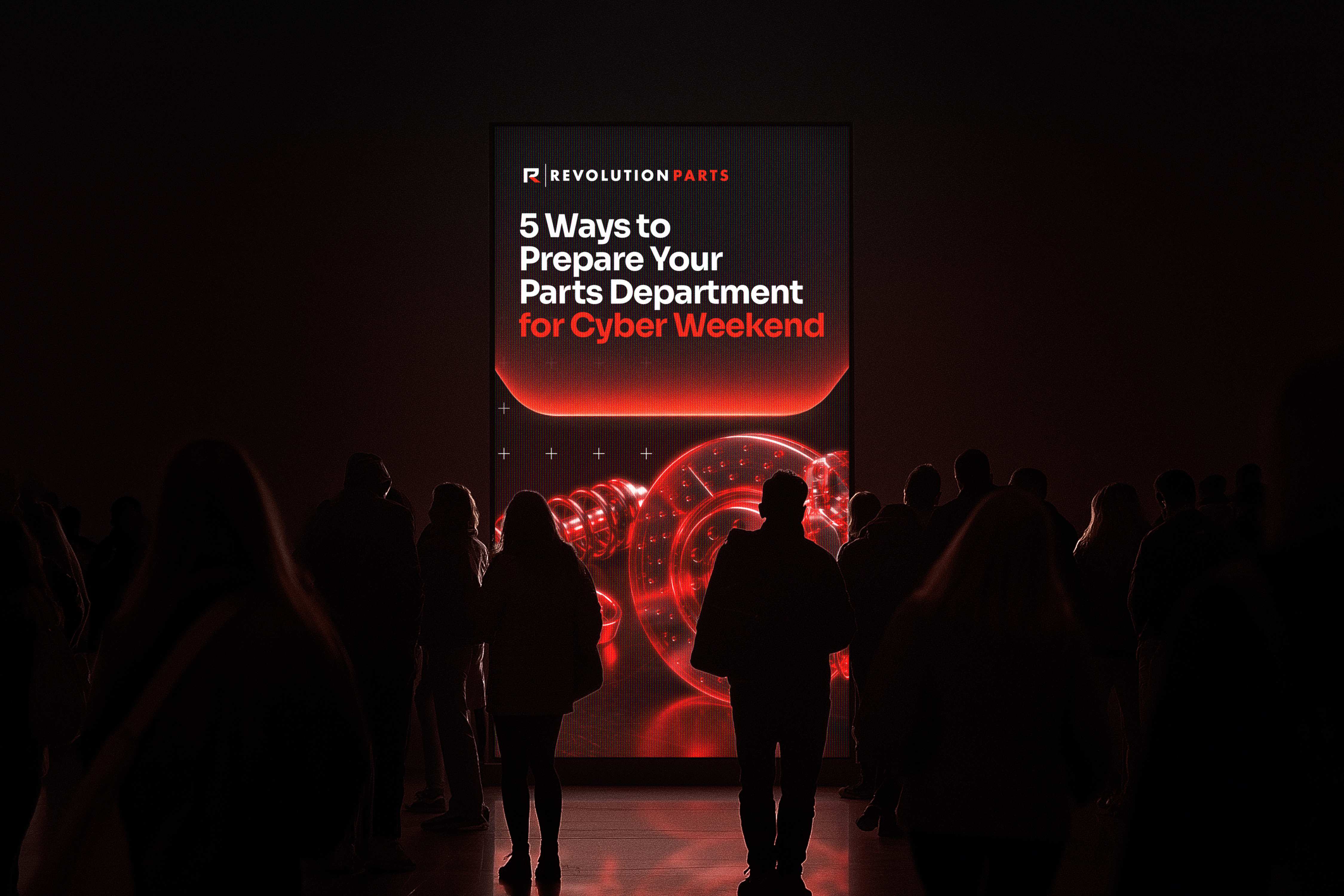 Large LED display with silhouetted crowd showing Cyber Weekend parts department campaign